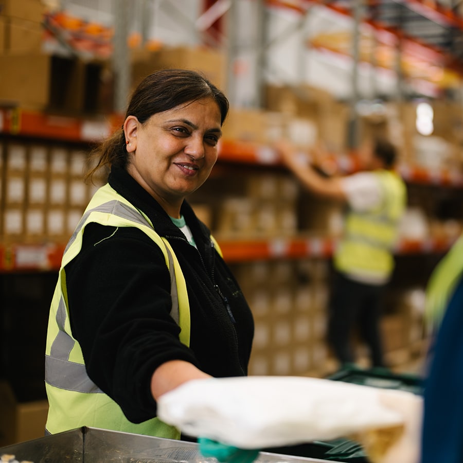 Lady working in a warehouse